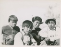 Image of Four Nain boys  [includes Ray Hunter, Ellen Harris?, Johnny Ado Ikkusik]